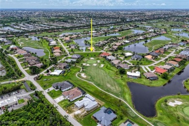 Nestled in the heart of Cape Coral, this extraordinary property on Royal Tee Country Club in Florida - for sale on GolfHomes.com, golf home, golf lot