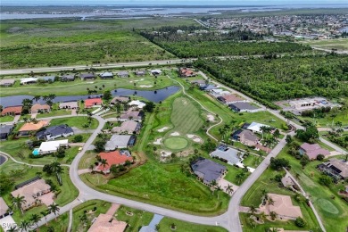 Nestled in the heart of Cape Coral, this extraordinary property on Royal Tee Country Club in Florida - for sale on GolfHomes.com, golf home, golf lot