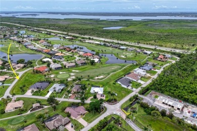 Nestled in the heart of Cape Coral, this extraordinary property on Royal Tee Country Club in Florida - for sale on GolfHomes.com, golf home, golf lot
