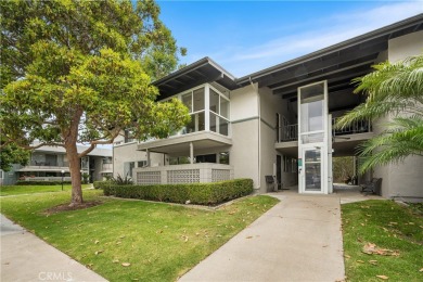 Step into this beautifully reimagined upstairs corner unit in on Leisure World Seal Beach Golf Course in California - for sale on GolfHomes.com, golf home, golf lot