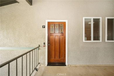 Step into this beautifully reimagined upstairs corner unit in on Leisure World Seal Beach Golf Course in California - for sale on GolfHomes.com, golf home, golf lot