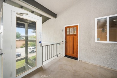 Step into this beautifully reimagined upstairs corner unit in on Leisure World Seal Beach Golf Course in California - for sale on GolfHomes.com, golf home, golf lot