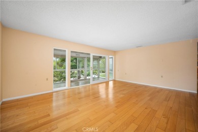 Step into this beautifully reimagined upstairs corner unit in on Leisure World Seal Beach Golf Course in California - for sale on GolfHomes.com, golf home, golf lot