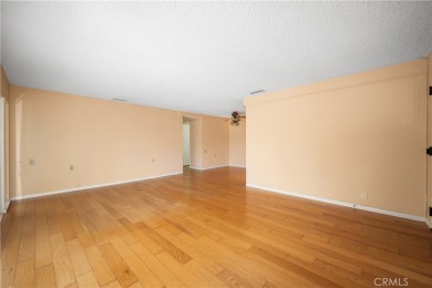 Step into this beautifully reimagined upstairs corner unit in on Leisure World Seal Beach Golf Course in California - for sale on GolfHomes.com, golf home, golf lot