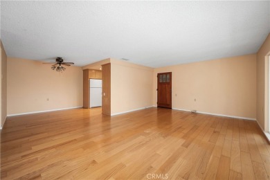 Step into this beautifully reimagined upstairs corner unit in on Leisure World Seal Beach Golf Course in California - for sale on GolfHomes.com, golf home, golf lot