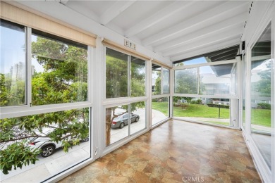 Step into this beautifully reimagined upstairs corner unit in on Leisure World Seal Beach Golf Course in California - for sale on GolfHomes.com, golf home, golf lot