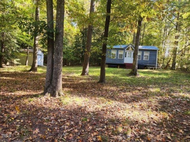 Welcome to the Lake Life! This great multi use lot is waiting on River Golf and County Club at Lake Royale in North Carolina - for sale on GolfHomes.com, golf home, golf lot