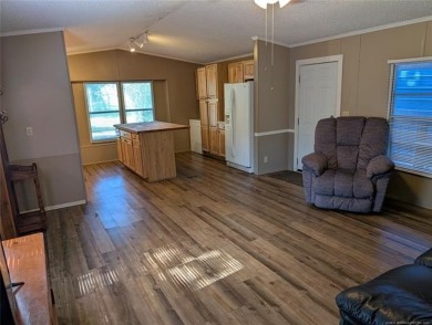 Enjoy a reasonably priced lake home in popular Arrowhead Estates on Arrowhead State Park Golf Course in Oklahoma - for sale on GolfHomes.com, golf home, golf lot