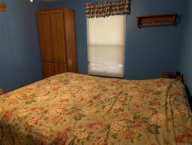 Enjoy a reasonably priced lake home in popular Arrowhead Estates on Arrowhead State Park Golf Course in Oklahoma - for sale on GolfHomes.com, golf home, golf lot
