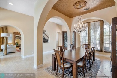 Stunning HOME in prestigious Edgewood at Heron Bay! This on Heron Bay Golf Club in Florida - for sale on GolfHomes.com, golf home, golf lot