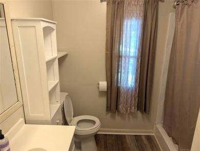 Enjoy a reasonably priced lake home in popular Arrowhead Estates on Arrowhead State Park Golf Course in Oklahoma - for sale on GolfHomes.com, golf home, golf lot