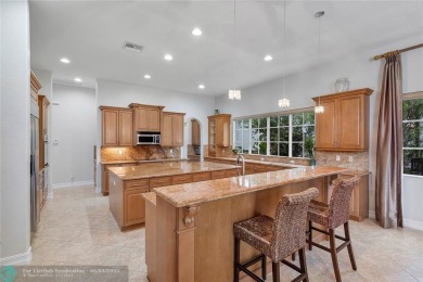 Stunning HOME in prestigious Edgewood at Heron Bay! This on Heron Bay Golf Club in Florida - for sale on GolfHomes.com, golf home, golf lot