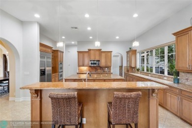 Stunning HOME in prestigious Edgewood at Heron Bay! This on Heron Bay Golf Club in Florida - for sale on GolfHomes.com, golf home, golf lot
