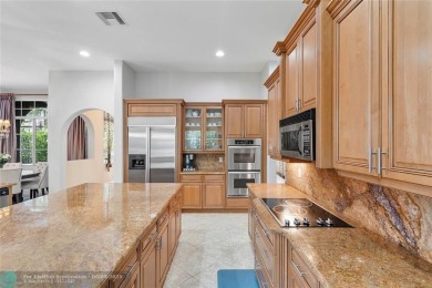 Stunning HOME in prestigious Edgewood at Heron Bay! This on Heron Bay Golf Club in Florida - for sale on GolfHomes.com, golf home, golf lot