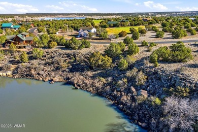Prime Waterfront Opportunity - Nestled directly on the serene on Silver Creek Golf Club in Arizona - for sale on GolfHomes.com, golf home, golf lot
