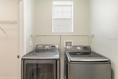 Welcome to this stunning 5-bedroom, 3.5-bath home with a on Harmony Golf Preserve in Florida - for sale on GolfHomes.com, golf home, golf lot