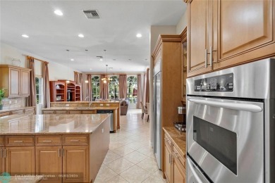 Stunning HOME in prestigious Edgewood at Heron Bay! This on Heron Bay Golf Club in Florida - for sale on GolfHomes.com, golf home, golf lot