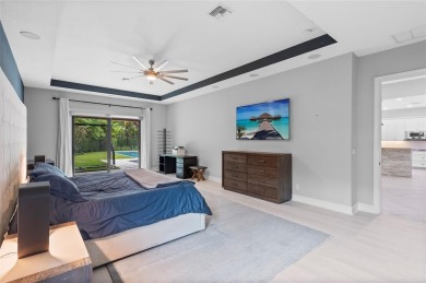 Gorgeous single story 3 bedroom 2 bath home w/custom pool/spa on Parkland Golf Club in Florida - for sale on GolfHomes.com, golf home, golf lot