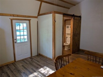 Enjoy a reasonably priced lake home in popular Arrowhead Estates on Arrowhead State Park Golf Course in Oklahoma - for sale on GolfHomes.com, golf home, golf lot