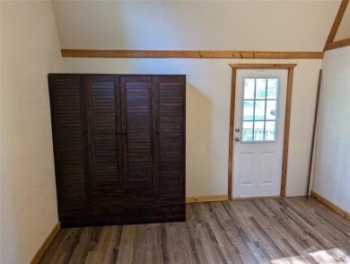 Enjoy a reasonably priced lake home in popular Arrowhead Estates on Arrowhead State Park Golf Course in Oklahoma - for sale on GolfHomes.com, golf home, golf lot