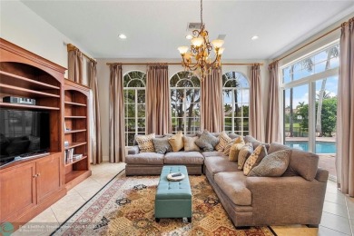 Stunning HOME in prestigious Edgewood at Heron Bay! This on Heron Bay Golf Club in Florida - for sale on GolfHomes.com, golf home, golf lot
