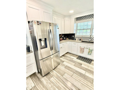 Fully remodeled, all-electric home with nearly 5,000 sq ft of on The Course at River Oaks in Arkansas - for sale on GolfHomes.com, golf home, golf lot