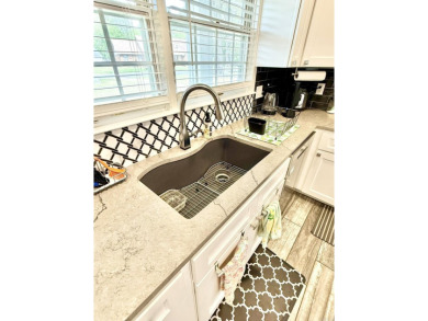 Fully remodeled, all-electric home with nearly 5,000 sq ft of on The Course at River Oaks in Arkansas - for sale on GolfHomes.com, golf home, golf lot