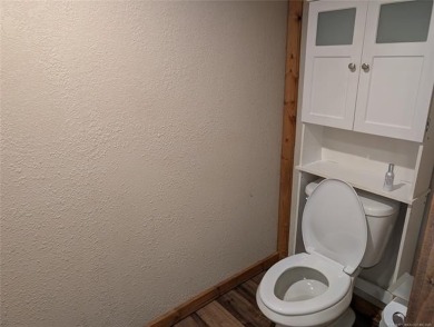 Enjoy a reasonably priced lake home in popular Arrowhead Estates on Arrowhead State Park Golf Course in Oklahoma - for sale on GolfHomes.com, golf home, golf lot