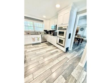 Fully remodeled, all-electric home with nearly 5,000 sq ft of on The Course at River Oaks in Arkansas - for sale on GolfHomes.com, golf home, golf lot