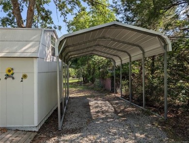 Enjoy a reasonably priced lake home in popular Arrowhead Estates on Arrowhead State Park Golf Course in Oklahoma - for sale on GolfHomes.com, golf home, golf lot