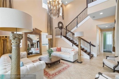 Stunning HOME in prestigious Edgewood at Heron Bay! This on Heron Bay Golf Club in Florida - for sale on GolfHomes.com, golf home, golf lot