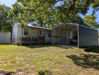 Enjoy a reasonably priced lake home in popular Arrowhead Estates on Arrowhead State Park Golf Course in Oklahoma - for sale on GolfHomes.com, golf home, golf lot