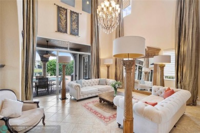 Stunning HOME in prestigious Edgewood at Heron Bay! This on Heron Bay Golf Club in Florida - for sale on GolfHomes.com, golf home, golf lot