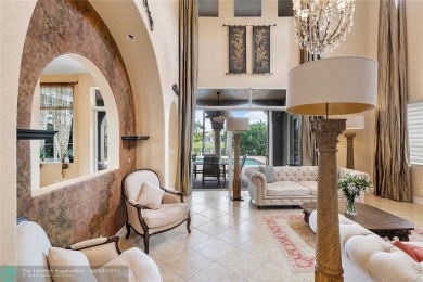 Stunning HOME in prestigious Edgewood at Heron Bay! This on Heron Bay Golf Club in Florida - for sale on GolfHomes.com, golf home, golf lot