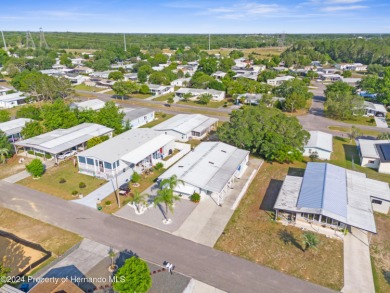A pristine, move-in ready home in a gated 55+ community with on Brookridge Country Club in Florida - for sale on GolfHomes.com, golf home, golf lot