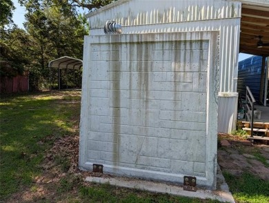 Enjoy a reasonably priced lake home in popular Arrowhead Estates on Arrowhead State Park Golf Course in Oklahoma - for sale on GolfHomes.com, golf home, golf lot