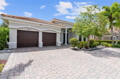 Gorgeous single story 3 bedroom 2 bath home w/custom pool/spa on Parkland Golf Club in Florida - for sale on GolfHomes.com, golf home, golf lot