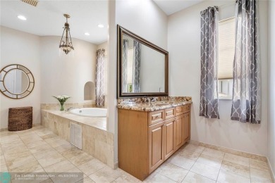Stunning HOME in prestigious Edgewood at Heron Bay! This on Heron Bay Golf Club in Florida - for sale on GolfHomes.com, golf home, golf lot