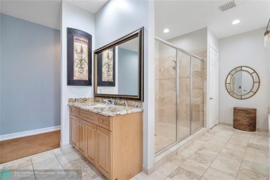 Stunning HOME in prestigious Edgewood at Heron Bay! This on Heron Bay Golf Club in Florida - for sale on GolfHomes.com, golf home, golf lot