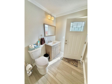 Fully remodeled, all-electric home with nearly 5,000 sq ft of on The Course at River Oaks in Arkansas - for sale on GolfHomes.com, golf home, golf lot