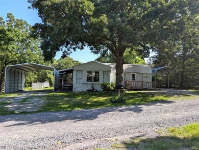 Enjoy a reasonably priced lake home in popular Arrowhead Estates on Arrowhead State Park Golf Course in Oklahoma - for sale on GolfHomes.com, golf home, golf lot