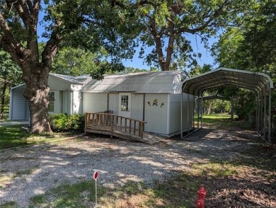 Enjoy a reasonably priced lake home in popular Arrowhead Estates on Arrowhead State Park Golf Course in Oklahoma - for sale on GolfHomes.com, golf home, golf lot