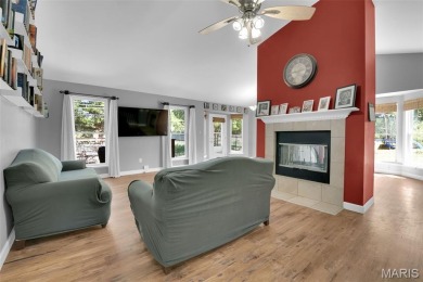 Welcome to your dream home in the exclusive, gated Raintree on Raintree Country Club in Missouri - for sale on GolfHomes.com, golf home, golf lot