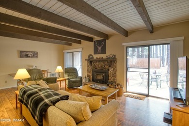 Surrounded by tall pines, this fully-furnished lower-level condo on Pinetop Lakes Golf and Country Club in Arizona - for sale on GolfHomes.com, golf home, golf lot