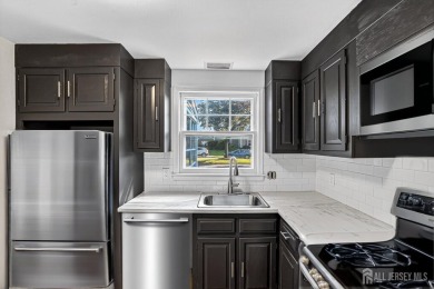 Welcome to 203 C Rossmoor Drive. This security gated adult on Rossmoor Golf Club in New Jersey - for sale on GolfHomes.com, golf home, golf lot