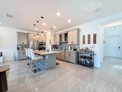 Welcome to this beautiful designed 3-bedroom + den, 2.5-bathroom on Crystal Lake Country Club in Florida - for sale on GolfHomes.com, golf home, golf lot