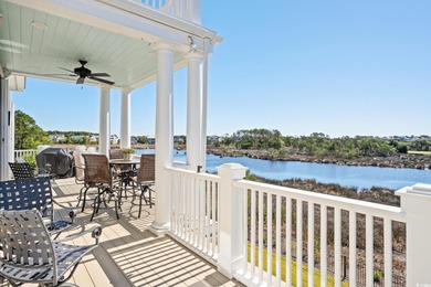 Enjoy breathtaking panoramic views of the marsh, estuary, and on DeBordieu Country Club in South Carolina - for sale on GolfHomes.com, golf home, golf lot