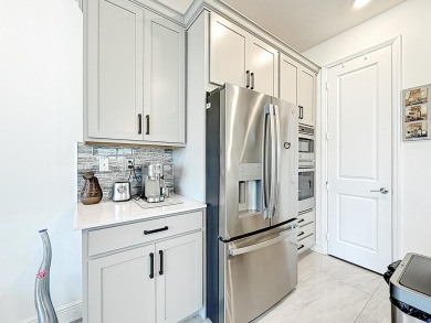 Welcome to this beautiful designed 3-bedroom + den, 2.5-bathroom on Crystal Lake Country Club in Florida - for sale on GolfHomes.com, golf home, golf lot