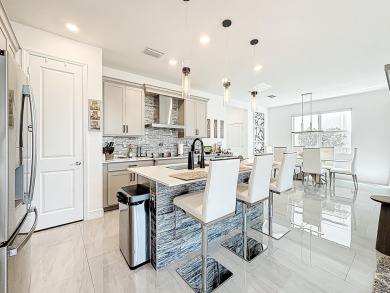 Welcome to this beautiful designed 3-bedroom + den, 2.5-bathroom on Crystal Lake Country Club in Florida - for sale on GolfHomes.com, golf home, golf lot