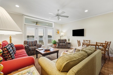 Enjoy breathtaking panoramic views of the marsh, estuary, and on DeBordieu Country Club in South Carolina - for sale on GolfHomes.com, golf home, golf lot